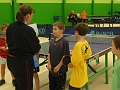 Lucas qui va se voir remettre une belle medaille pour sa 3eme place par Corine Molins